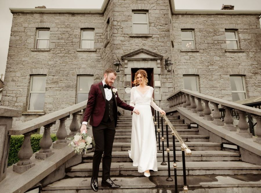 Bride & Groom at Glenlo Abbey Entrance